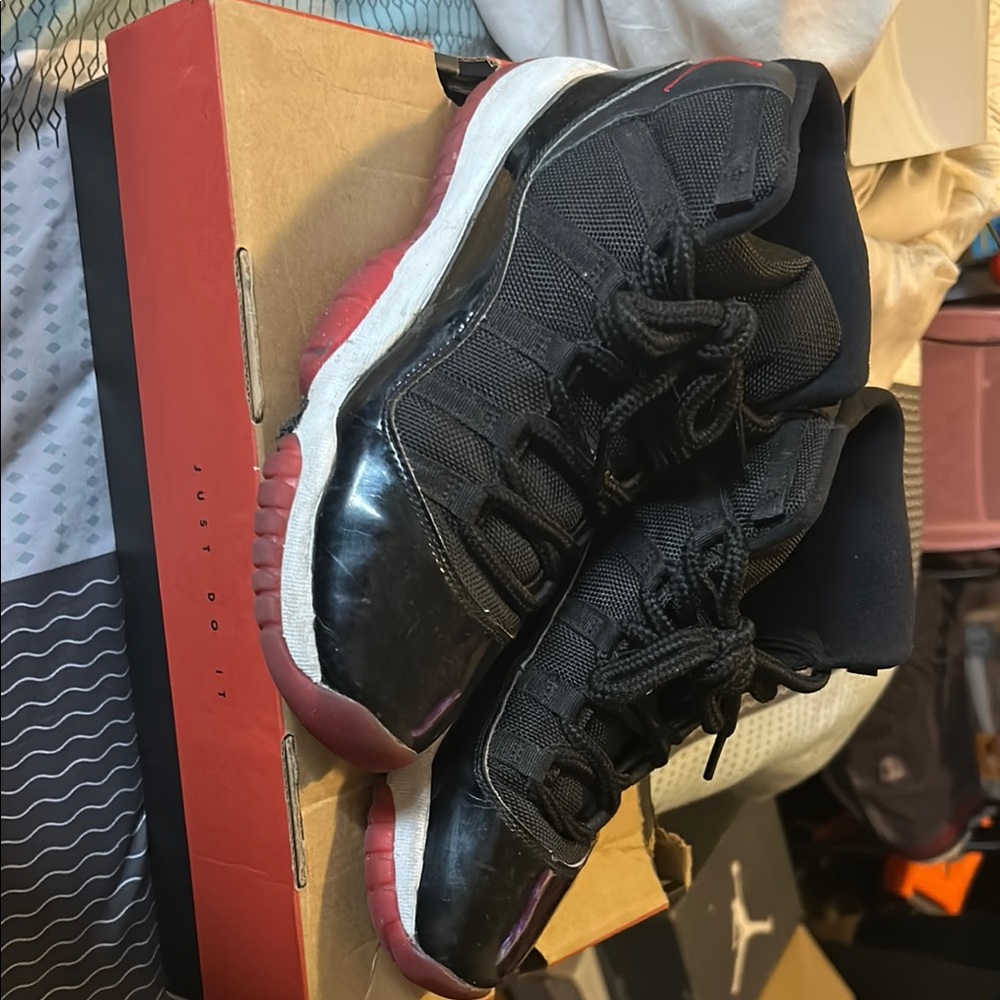 Jordan big kids bread 11’s